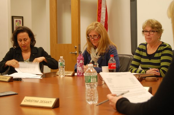 Board members Jackie Lowey, Liz Pucci, and School Board President Patricia Hope at the board meeting on April 1. Erica Thompson