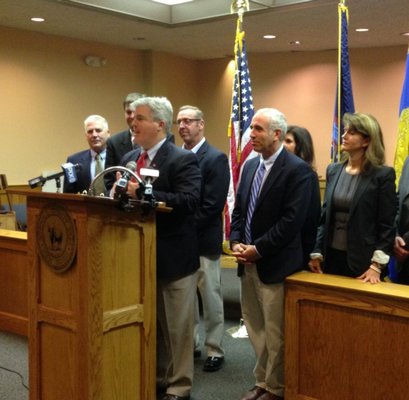 Suffolk County Executive Steve Bellone, surrounded by East End officials, announced that the trailers housing homeless convicted sex offenders would be closed over the Memorial Day weekend. BY PAUL SQUIRE/RIVERHEAD NEWS-REVIEW
