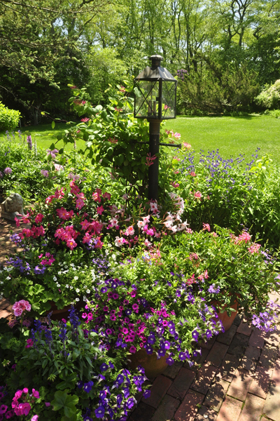 Joan and Mort Hamburg's garden in Sagaponack will be featured on the "Landscape Pleasures: Down the Garden Path" tour this weekend. MICHELLE TRAURING