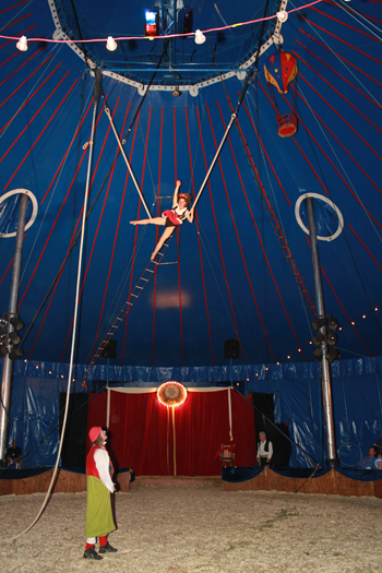 Amy Riccio Zoppe flies above the crowd at the Zoppe Italian Circus on the Great Lawn in Westhampton Beach last year.