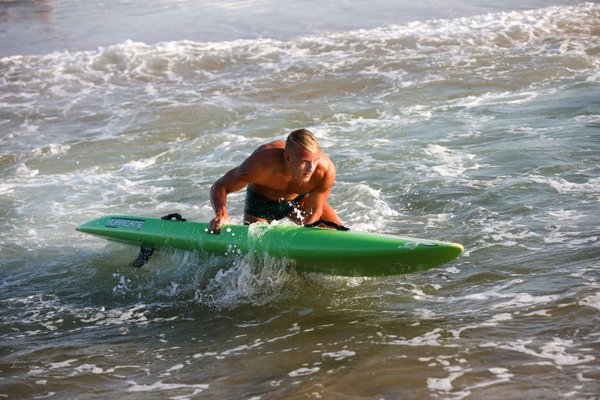 A Westhampton guard comes out of the surf.