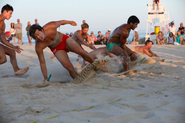 Guards battle it out in the beach flags competition.