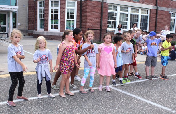 Kids at the annual Southampton Youth Association barbeque at Southampton Elementary School on August 7, celebrating the Association's 50th birthday. TOM KOCHIE