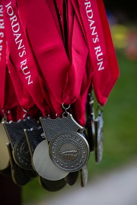 Medals for finishing Jordan's Run.