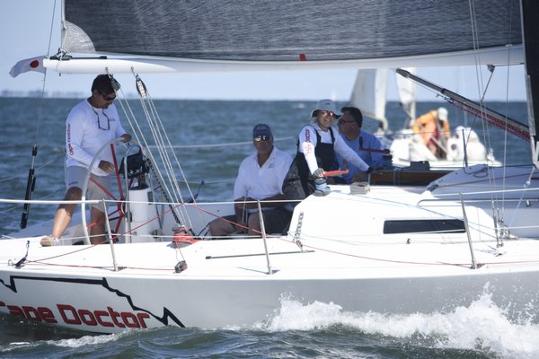 Crew members of Cape Doctor out of Mattituck give a wave.