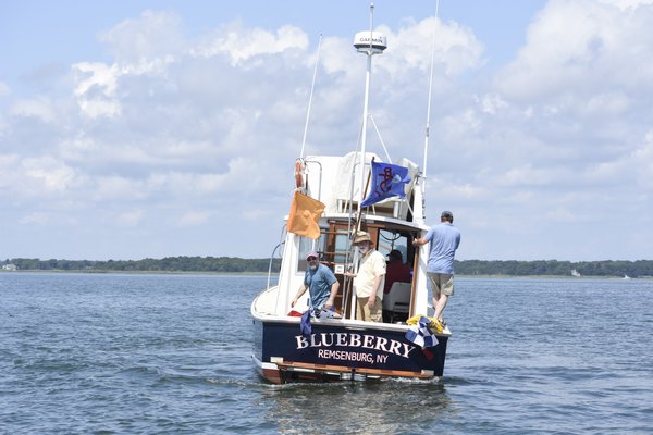 Blueberry, the offial race boat, gets set for races on Saturday.