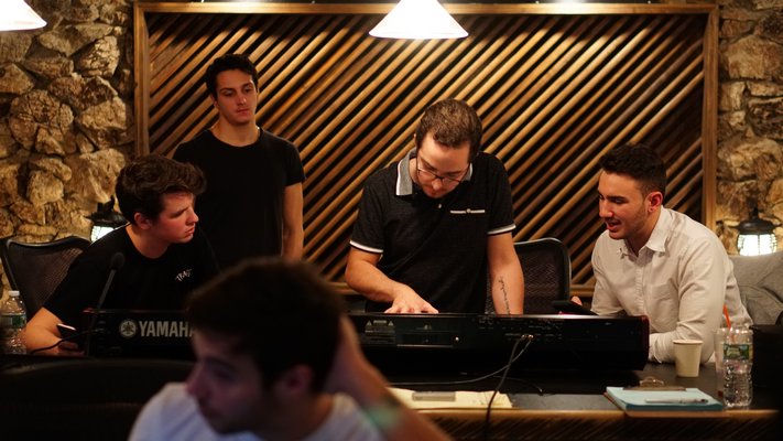 Christiaan Padavan, seated, left, with his band mates and engineers during the recording session for the 
