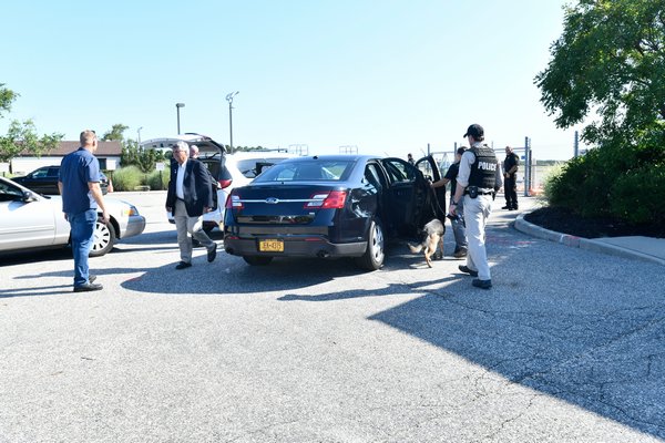 Security was tight at Gabreski Airport on Friday morning prior to President Donald Trump's arrival in the Hamptons. DANA SHAW