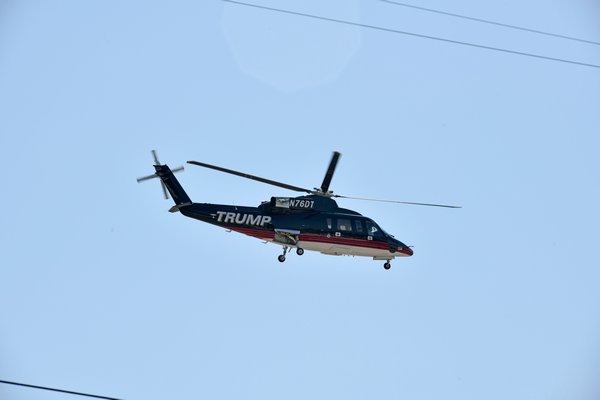 A Trump helicopter lands at Gabreski Airport on Friday morning.         DANA SHAW