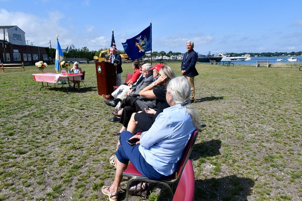 Southampton Town Supervisor Jay Schneiderman speaks at the ceremony at John Steinbeck Waterfront Park in Sag Harbor on Friday. DANA SHAW