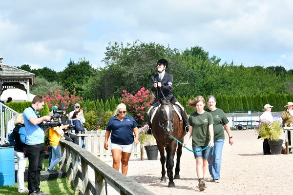 Bruce Fint rides at the Long Island Horse Show Series for Riders with Disabilities on Monday morning at the Hampton Classic. DANA SHAW