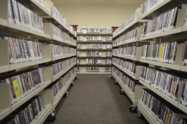 The new media space on the first floor has DVDs and video games ready to be checked out. ANISAH ABDULLAH