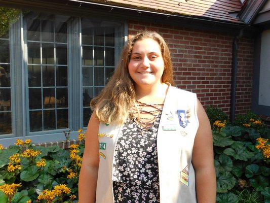 Lucia Ibrahim is raising money to rebuild the cabin at Camp Norweska for future girl and boy scouts.   ELIZABETH VESPE