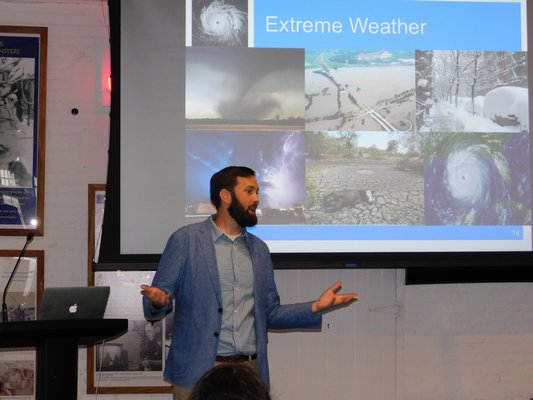 Kevin Reed, a Stony Brook University professor, delivered a lecture about extreme weather on Thursday at the Montauk Lighthouse.   ELIZABETH VESPE