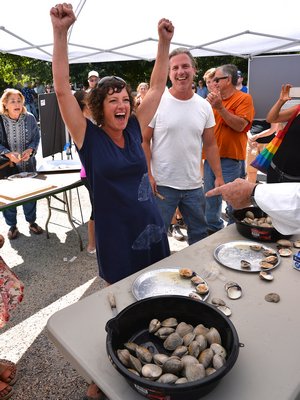 Meredith O’Leary and Jack Dougherty went tooth and nail in the Clam-shucking contest. KYRIL BROMLEY