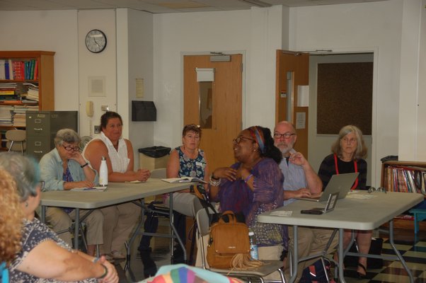 Sag Harbor residents listening to Dr. Oliver Robinson, the superintendent of Shenendehowa Central School District in Albany and New York State superintendent of the year, speaker on Friday.  ELIZABETH VESPE