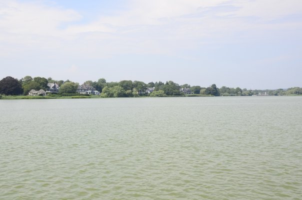 Lake Agawam in Southampton Village is plagued by blue-green algae blooms every summer. GREG WEHNER