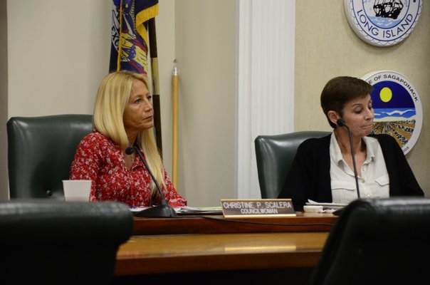 Town Board Members Christine Scalera, left, and Julie Lofstad initially voted against establishing a utility district along Cliff Drive because they could not see how it would benefit the greater public. GREG WEHNER