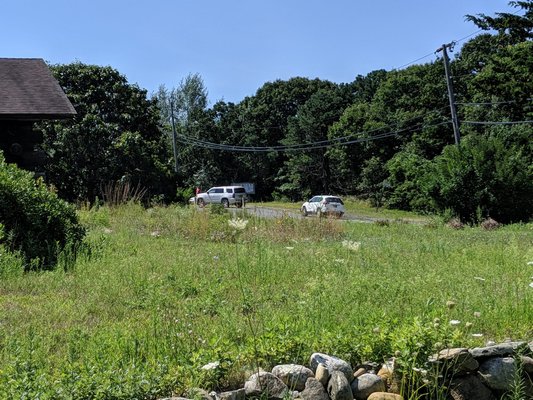 Cars were seen entering the Shinnecock Indian Nation territory Friday, while a shooting was being investigated from earlier that morning. JENNIFER CORR