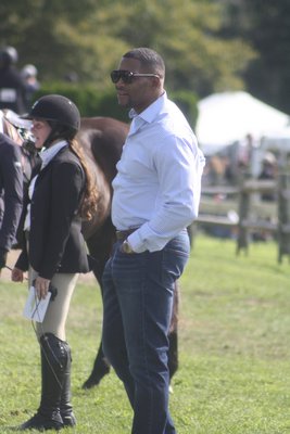 Former New York Giants star Michael Strahan watched his daughters, Isabella and Sophia, compete in the Hampton Classic.