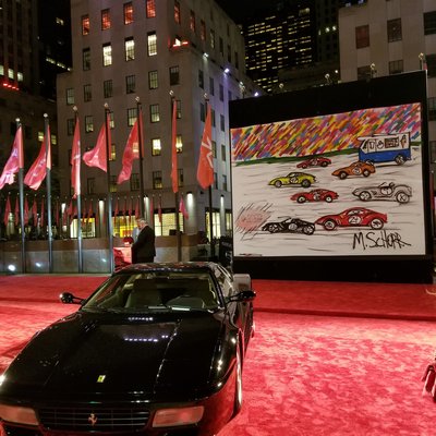 Mitchell Schorr's work on view at a Ferrari exhibtion at Rockefeller Center in New York City.