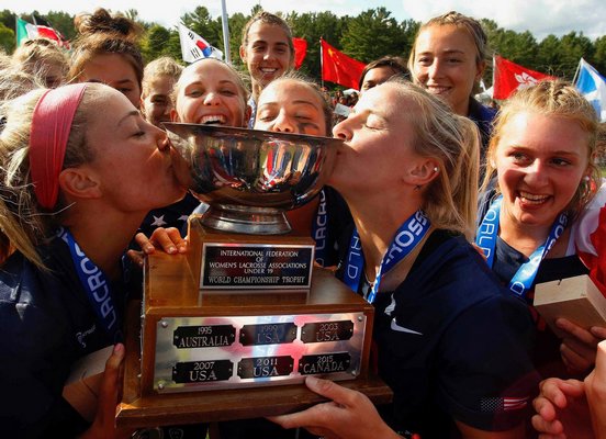 Isabelle Smith and her U.S. teammates celebrate their U19 World Championship after defeating Canada, 13-3, on Saturday.