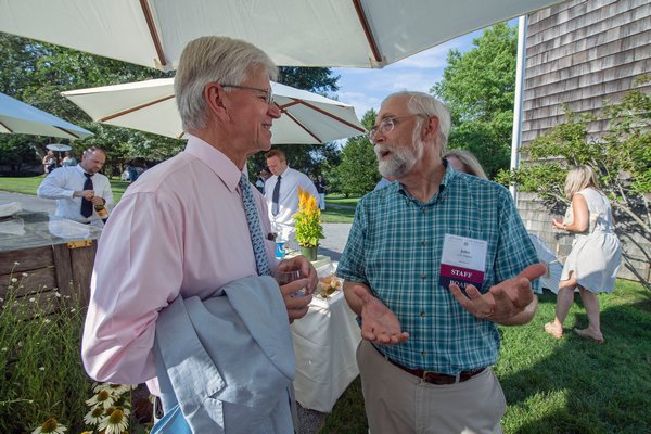 Fred Thiele and John v.H. Halsey chat during the annual Peconic Land Trust Gala at the Ocean View Farm in Bridgehampton on Sunday evening.