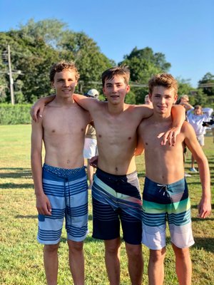 There was a three-way tie for the boys tri, from left, Patrick Hentemann, George Fugelsang and Jack Sartorius.