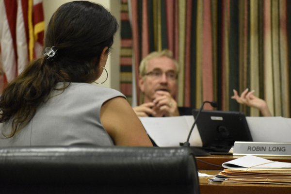 Southampton Town Planner Claire Shea and Southampton Town Planning Board Co-Chairman Dennis Finnerty discuss the final scope on Thursday. VALEIRE GORDON