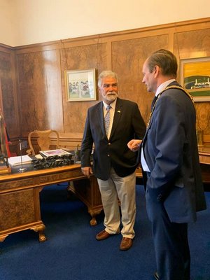 Aram Terchunian, left, of Westhampton Beach, presents Mayor Peter Baillie of Southampton, England with a proclamation. COURTESY ARAM TERCHUNIAN