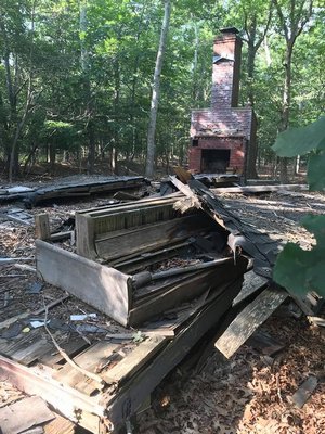 The debris from the 50-year-old cabin. The fireplace was still in-tact.  COURTESY LUCIA IBRAHIM