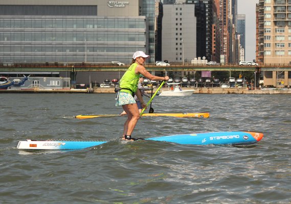Evelyn O'Doherty of Amagansett, participated in a 25-mile paddleboard event for charity on Saturday in New York City.               COURTESY EVELYN O'DOHERTY