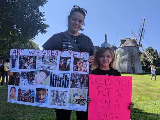 Protesters Lisa Votino and six-year-old Lily Tarrant.