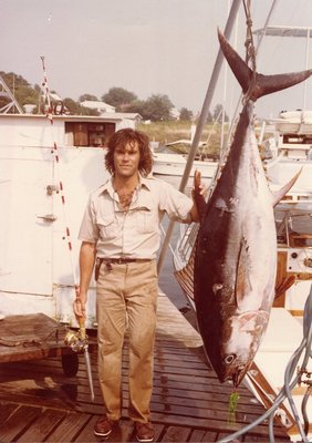 Tred Barta with the 215 pound bigeye tuna he caught on a 20-pound test rated line, a world record that still stands today.