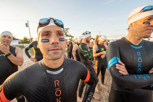 Chris Williams waits to go into the water prior to the start of the Mighty Hamptons Triathlon.