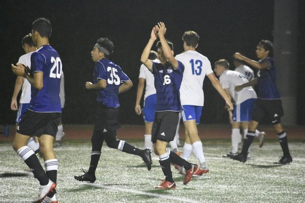 Milan Moraga celebrates his team's 1-0 victory over Mattituck on September 10. His lone goal was the difference in the tightly contested game.