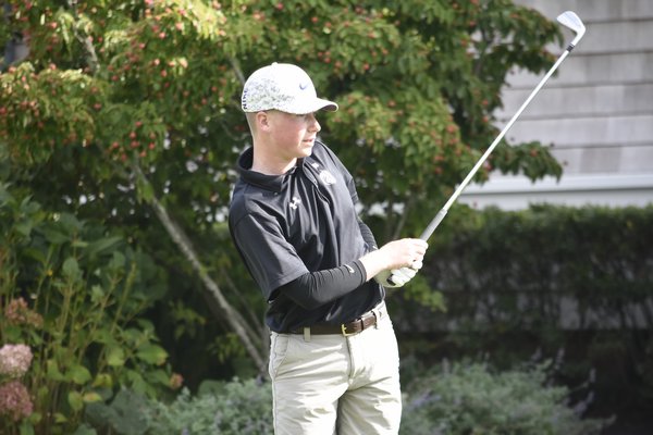 Westhampton Beach senior Coady Sumwalt tees off at the first hole at Westhampton Country Club on September 18.