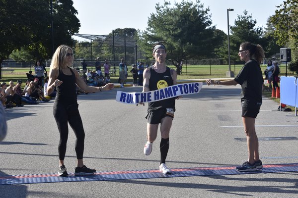 Erik Reitinger, 36, of Brooklyn won the 13th annual Hamptons Half Marathon on Saturday morning.