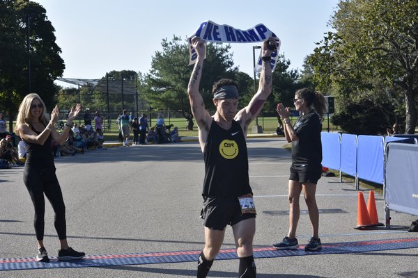 Erik Reitinger, 36, of Brooklyn won the 13th annual Hamptons Half Marathon on Saturday morning.