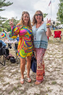 Susan Morrissey and Kathleen Brown during the Mash at Bash fundraiser event to commemorate the anniversary of Woodstock at Mashashimuet Park on Sunday afternoon.      MICHAEL HELLER