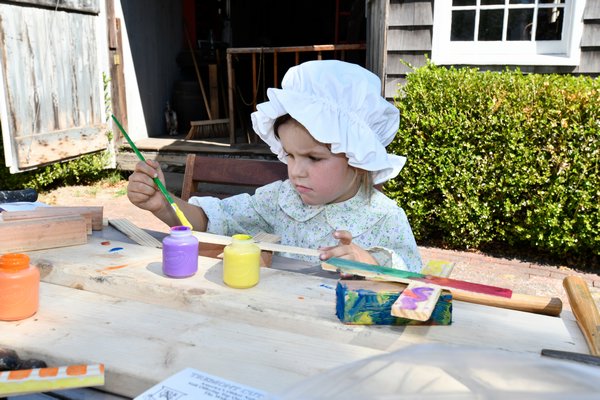 Rosalind Aldridge-Krawciw works on a project at the Southampton History Museum's Harvest Fair on Saturday.