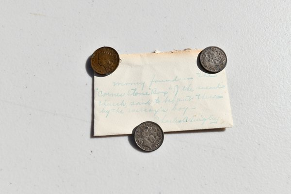 Money from 1905 found in the cornerstone box.  DANA SHAW