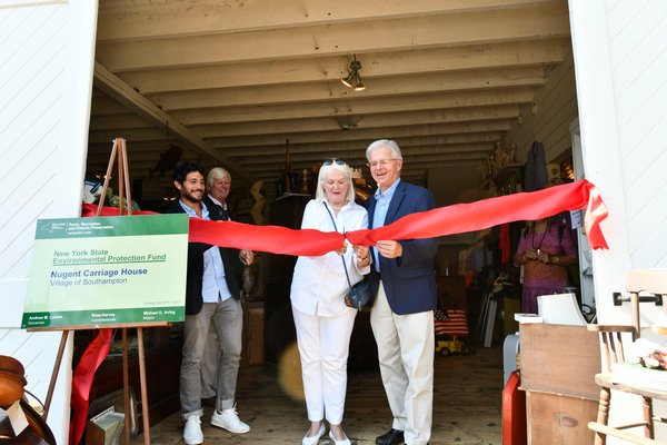 Nancy McGann, president of the Southampton History Museum, and New York State Assemblyman Fred W. Thiele Jr., cut the ribbon at the grand opening of the Nugent Carriage House on in early August. The building was recently rehabilitated using funds from the NYS Environmental Protection Fund and the Village of Southampton.  The shop is open on Fridays and Saturdays until October 12, from 11 a.m. to 4 p.m.           DANA SHAW
