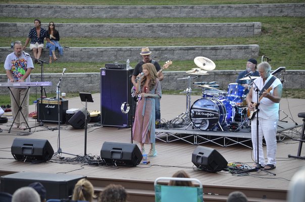Local cover band P.M. Overdrive performed for the final show of Good Ground Park's summer concert series. ANISAH ABDULLAH