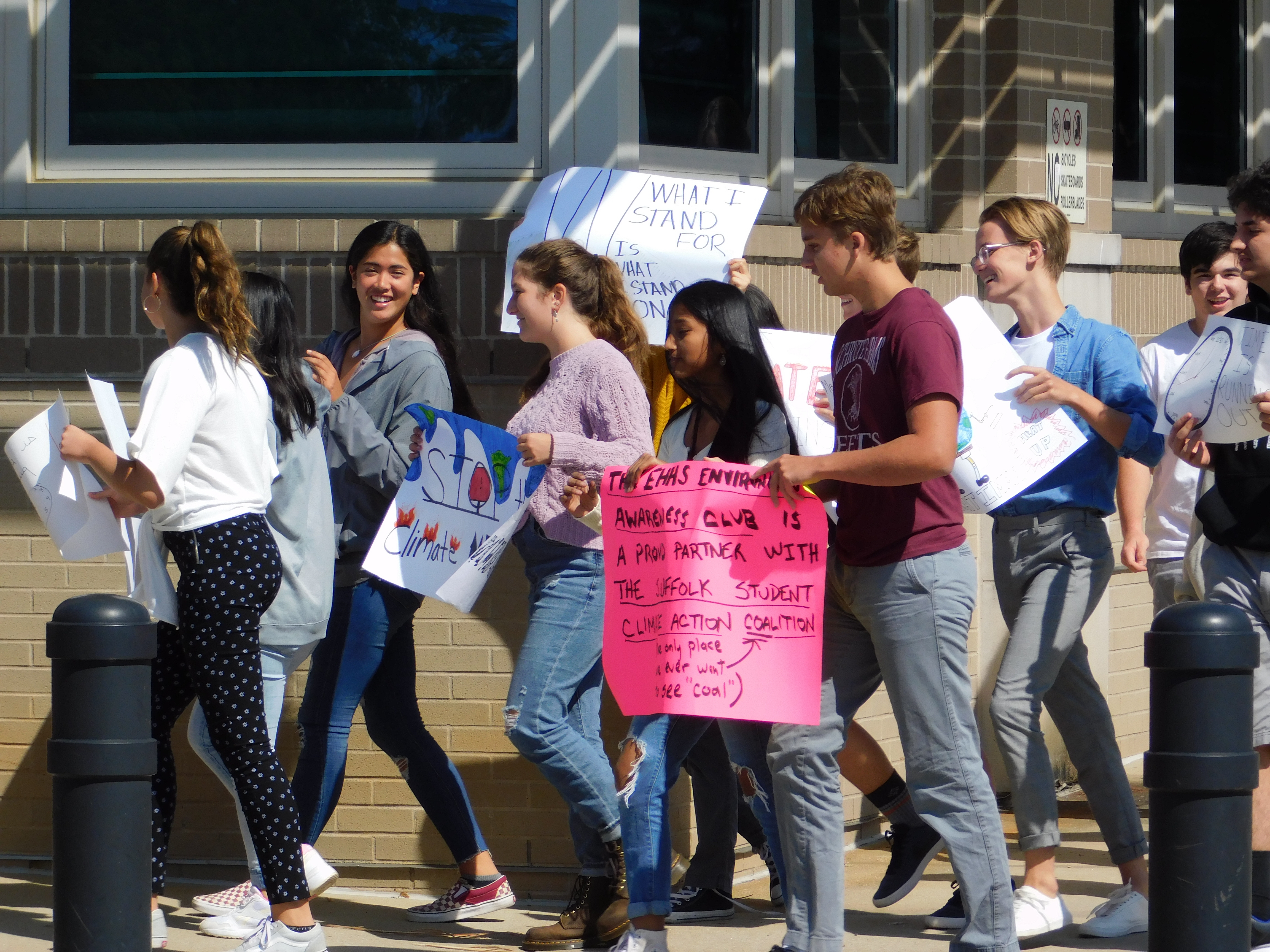 The East Hampton High School Environmental Awareness Club walked out of class on Friday afternoon in solidarity with major climate change strikes happening throughout the globe. ELIZABETH VESPE