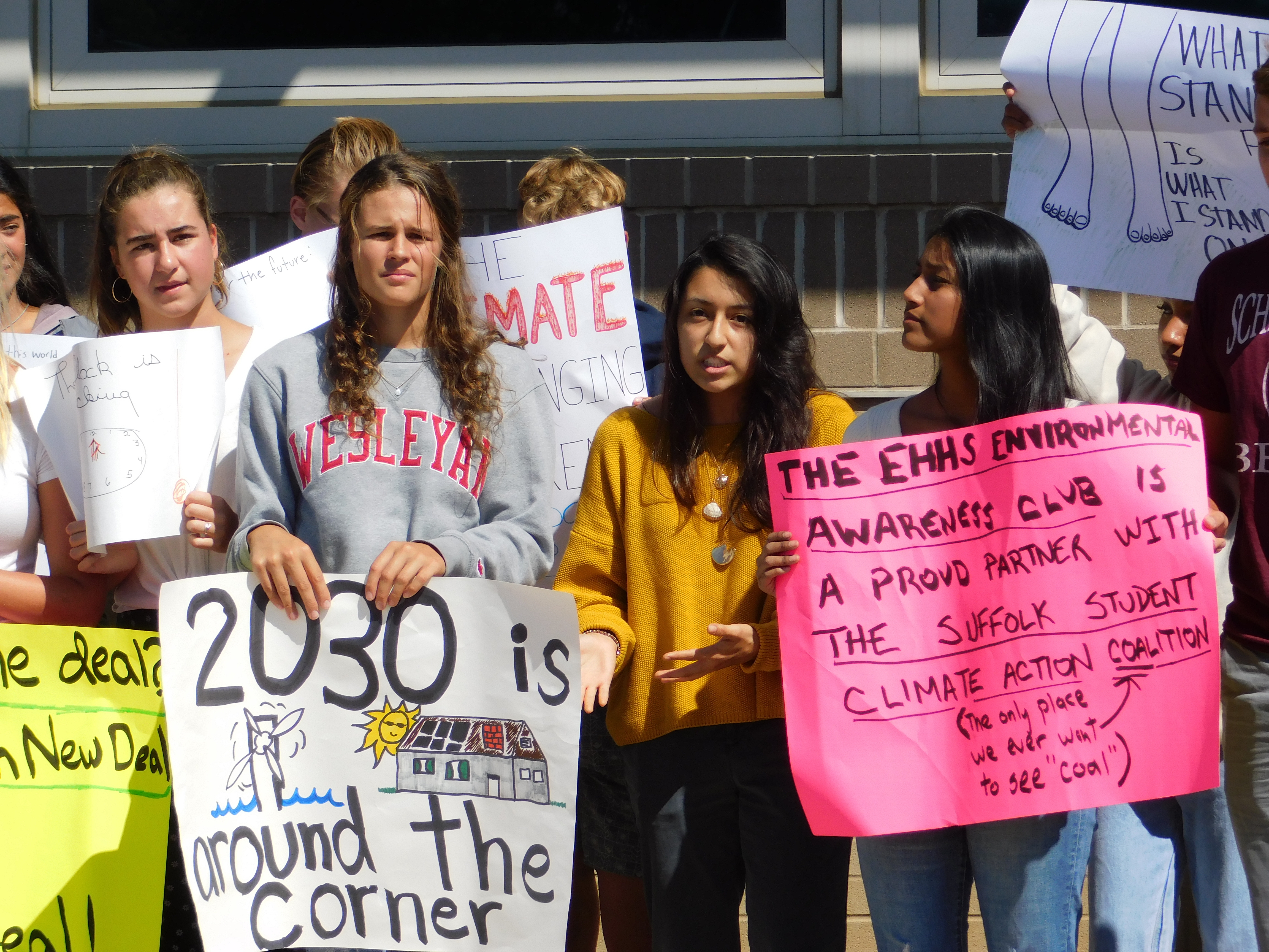 The East Hampton High School Environmental Awareness Club walked out of class on Friday afternoon in solidarity with major climate change strikes happening throughout the globe. ELIZABETH VESPE