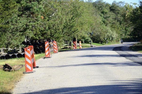 The Suffolk County Water Authority extended the water main down Damascus Road in East Quogue, and the Town of Southampton is paying for homes along the road to connect to the new main. GREG WEHNER