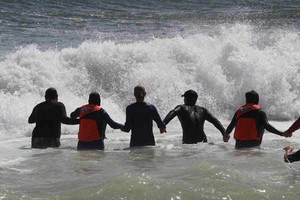 A Walk on Water, known as AWOW, hosted two day sof surf therapy for those with special needs and their families on Friday and Saturday at Ditch Plains Beach in Montauk. KYRIL BROMLEY
