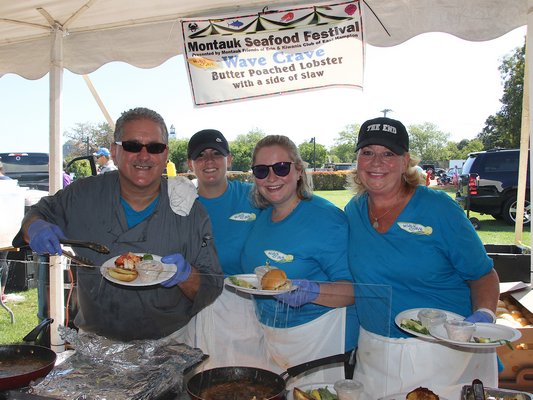 The Montauk Seafood Festvial was a popular draw last weekend. Steven, Samantha, and Colleen Paluba, and Kristen Znaniecki. KYRIL BROMLEY