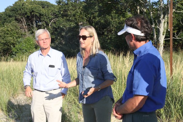 Assemblyman Fred W. Thiele Jr., Legislator Bridget Fleming and East Hampton Trustee Rick Drew were among the local officials who meet with residents of the SANS community (Sag Harbor Hills, Azurest and Ninevah) on September 4 to consider a dredging plan for Little Northwest Creek, which has turned west and eroded the beach in front of the Ninevah community.